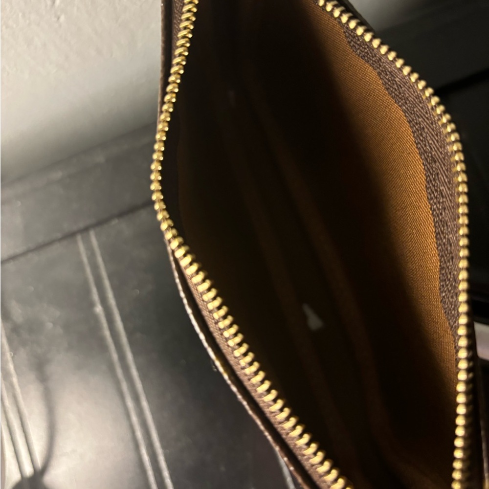 Authentic Louis Vuitton small hand bag worn three times in great shape like new